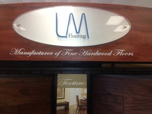 LM Flooring logo - Main Street Carpets and Flooring in Texas City, TX