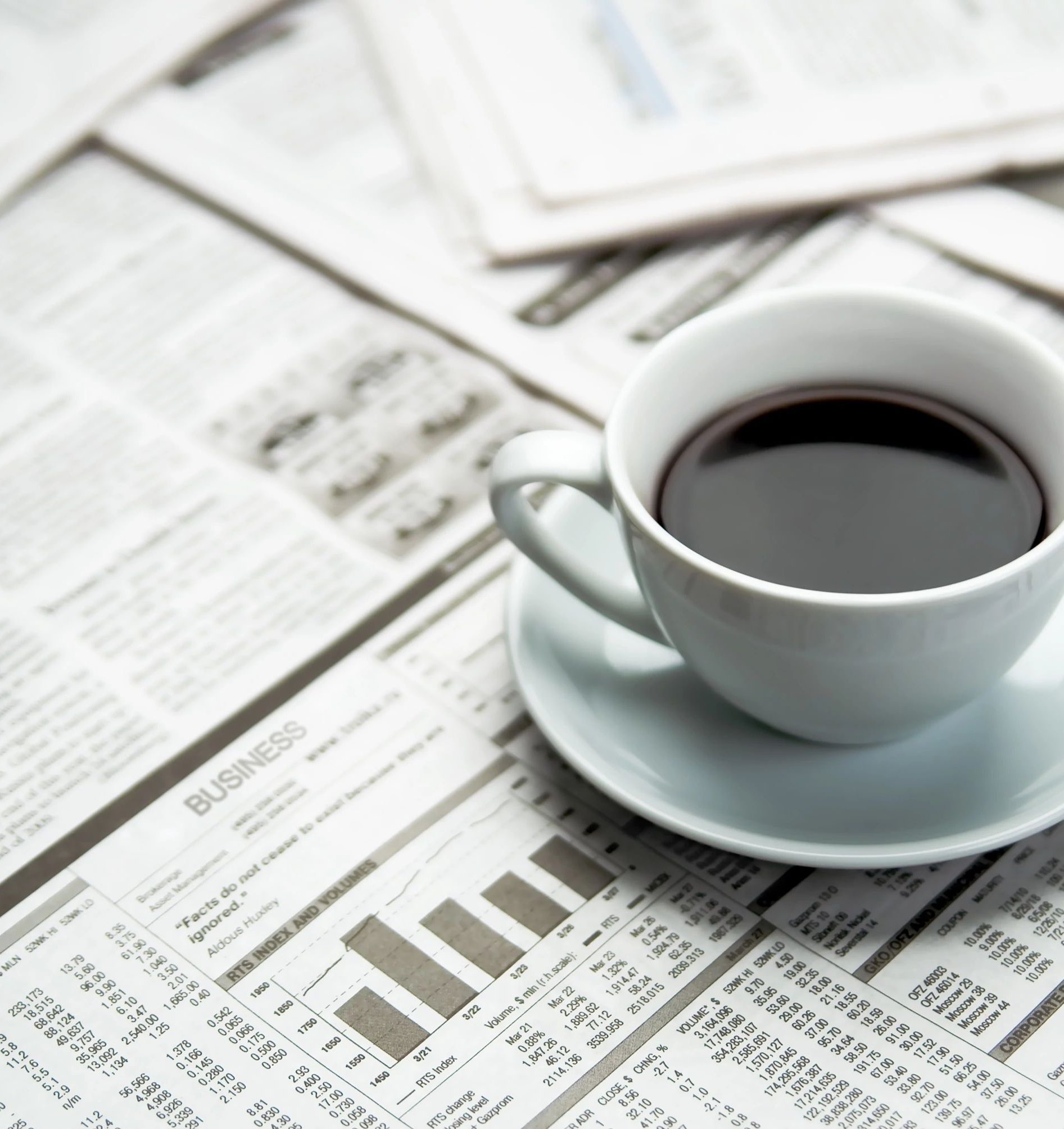 coffee on newspapers - Main Street Carpets and Flooring in Texas City, TX